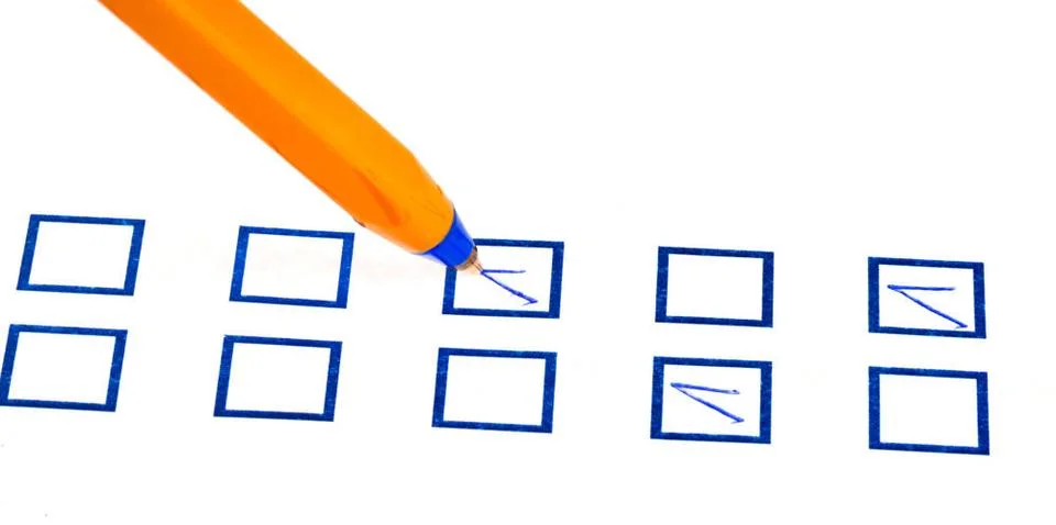 Tick in blue square box tick in blue square box by simple yellow pen Copyr... Stock Photos