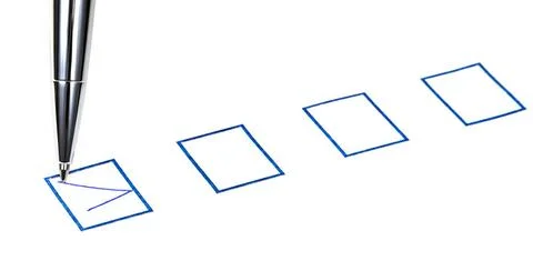 Tick in blue square box tick in blue square box by silver metal pen Copyri... Stock Photos
