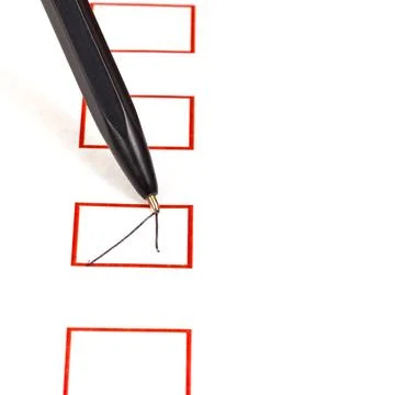 Tick in red square box tick in red square box by simple black ballpen Copy... Stock Photos