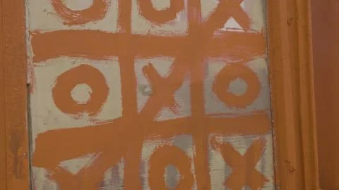 Tick tack toe on black message board, abstract of business success and 스톡 사진