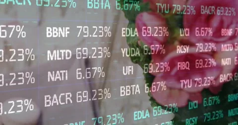 Ticker overlay cycling codes and rates on feed, panning right revealing flowers Stock Footage 333802982
