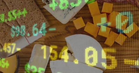 Ticker starting on playback, scrolling bright digits across cheese platter, Stock Footage 323335985