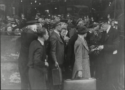 Ticket Collection. The Collection Queue Marshaled By The Police Pass Onto The Pl Stock Photos