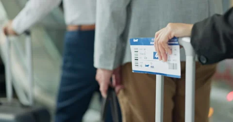 Ticket, travel and immigration queue by people at an airport with luggage for Stock Footage 255219190