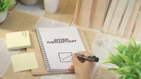 TICKING OFF REVIEW SUBSCRIPTIONS FROM CHECKLIST Stock Footage 308082917
