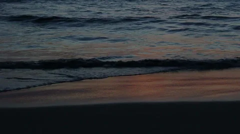 Tidal bore in the evening, ocean beach Video stock 33197744