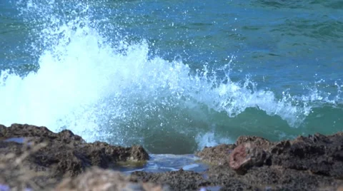 Tidal bore. The waves beat against the rocks. 4K Video stock 64801412
