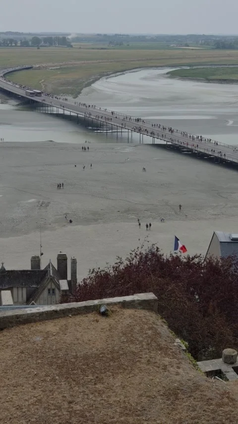 Tidal flats of the bay and the causeway seen from Mont-Saint-Michel, Normandy Stock Footage 346368451