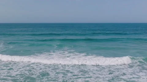 Tidal Ocean Waves Slowly Going Onto Shoreline In Razo Beach. Slow Motion Stockbeeldmateriaal 238806914