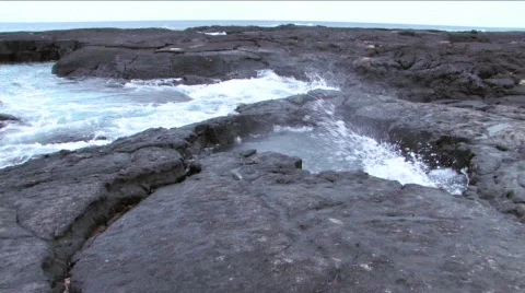 Tidal pool rising and falling in Galapagos Islands Stock Footage 298177