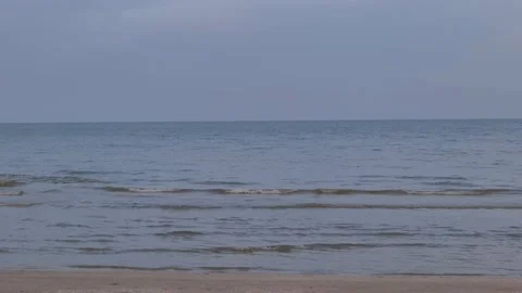 Tidal wave to the beach and overcast rainy sky. Stock Footage 197394735