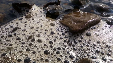Tidal waves hitting the shore with foam Stock Footage 112141547