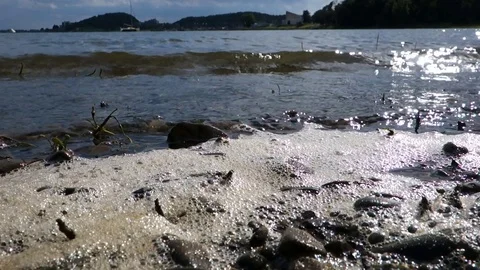 Tidal waves hitting the shore with foam Stock Footage 112141566