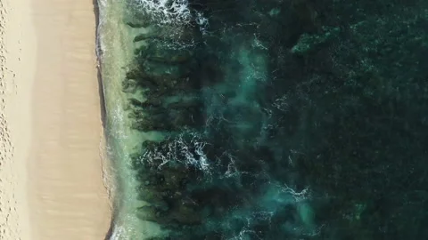 Tidal waves splashing on a white sand beach in Bali Stock Footage 132611092