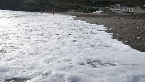 Tide coming in on a beach Stock Footage 115519684