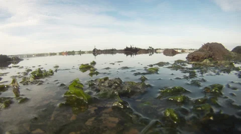 Tide coming in camera submergered 02 Stock Footage 33889681