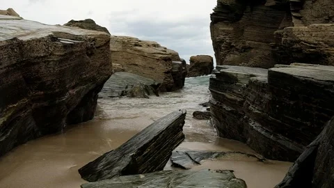 Tide entering through the rocks Stock Footage 251577628
