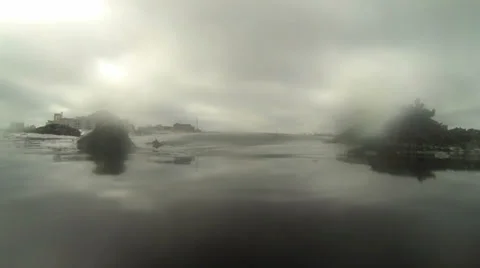 Tide going out rocks in forground 03 Stock Footage 33898786