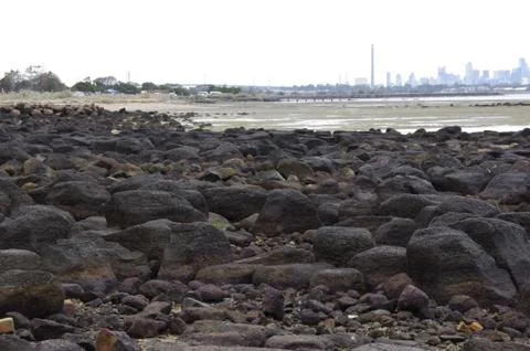 Tide out at beach Stock Photos
