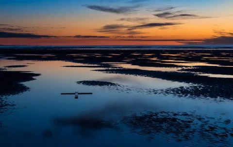 Tide out cross Stock Photos