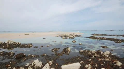 Tide rising over beach Stock Footage 23934766