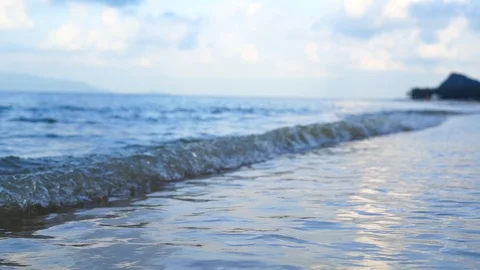 Tide, surf of the waves on the shore in slow motion Stock Footage 117297165