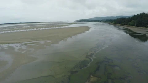Tide washing onto a beach Stock Footage 154926082