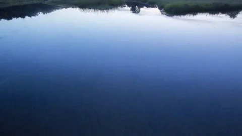 Tides: Atlantic, Reflection of Clouds and Sky during Sunset Stock Footage 69239958