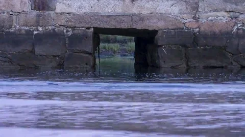Tides: Atlantic, Rising Tide with Culvert during Day Stock Footage 69260964