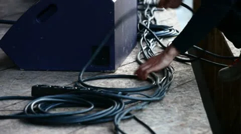 Tidy up cables on stage Stock Footage 11022871