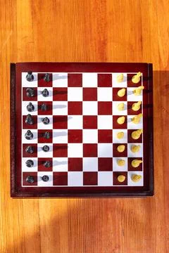 Tidy chess board on the table Stock Photos