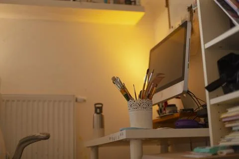 Tidy desk setup with tools for studying and online learning at night Stock Photos