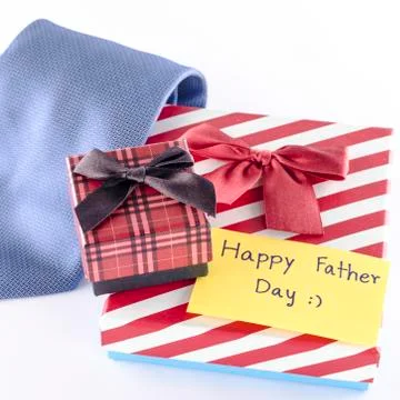 Tie and two gift boxes with card tag write happy father day word 写真素材