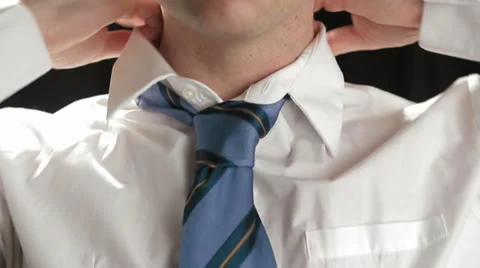 Tie dressing by anonymous businessman studio Stock Footage 24783204