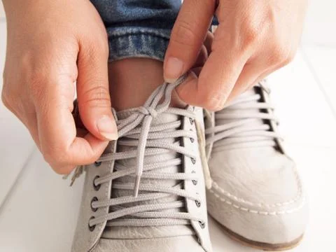 Tie a shoe string Stock Photos