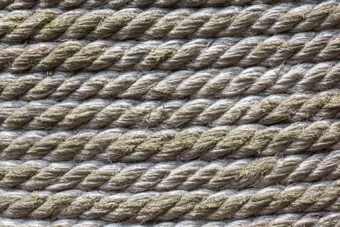 Tied rope texture in a row in parallel line background Foto stock