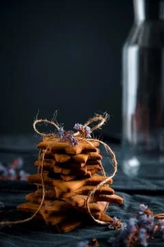 Tied stack of star shaped gingerbread cookies. Stock Photos