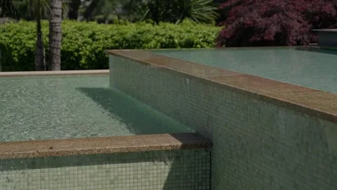 Tiered Infinity Pool Corner With Water Overflowing Between Levels Stock Footage 340181971