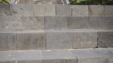 Tiered outdoor staircase structure made of solid grey natural basalt stone Stock-Footage 341675932