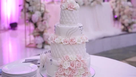 Tiered white wedding cake Stock Footage 160413636