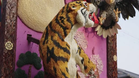 Tiger and Eagle, rendered in Foodstuffs, On display at Sagicho Matsuri Video stock 186473807