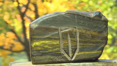 Tiger eye stone. Ferrous quartzite from Ukraine. Trident. Proterozoic. Stock Footage 253287335