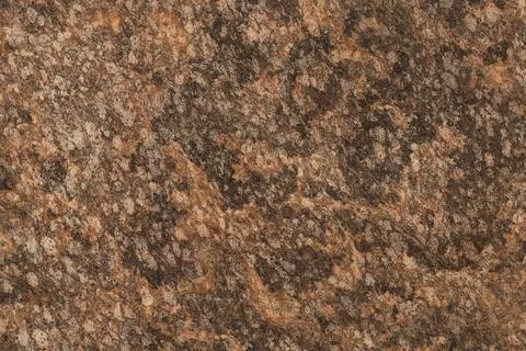 Tiger Granite Stone Surface With Veining and Earthy Textures Stockfoto's