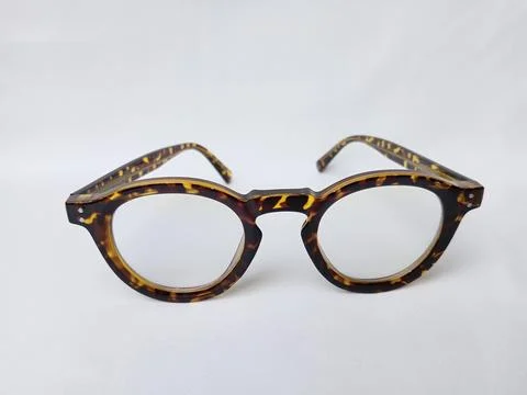 Tiger pattern eyeglass on white background. Stock Photos
