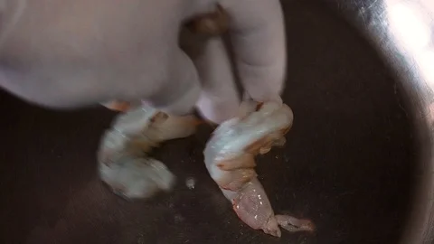 Tiger prawns on grills Stock Footage 99438088