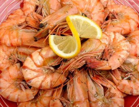 Tiger prawns with lemon Stock Photos