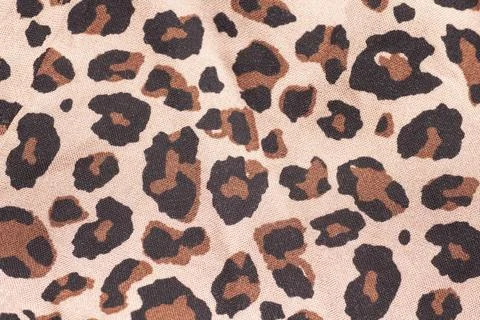 Tiger print fabric texture background close up Foto stock