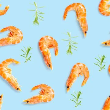 Tiger shrimp. Seamless pattern made from Prawn isolated on a blue background Stock Photos