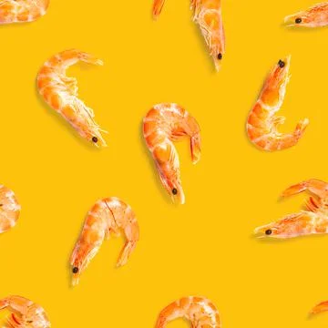 Tiger shrimp. Seamless pattern made from Prawn isolated on a orange background Stockfoto's