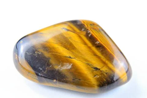 Tiger's eye (also called tiger eye) gemstone Stock Photos